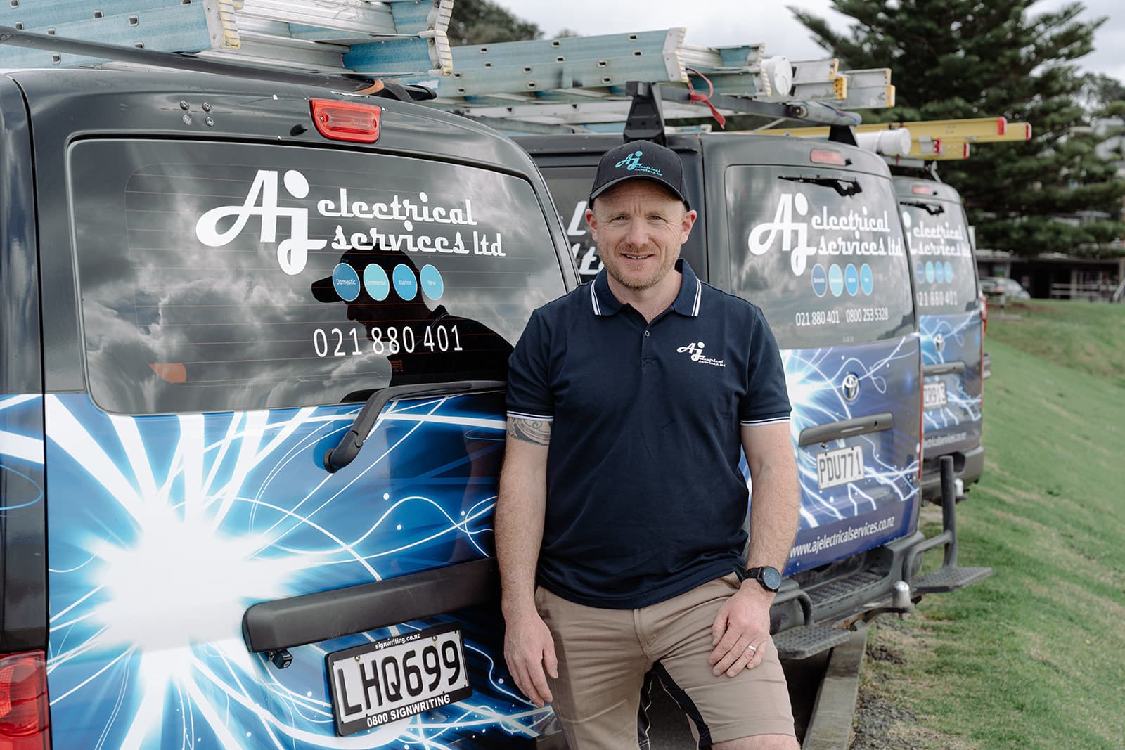 Andre, founder of AJ Electrical, with one of the company vans