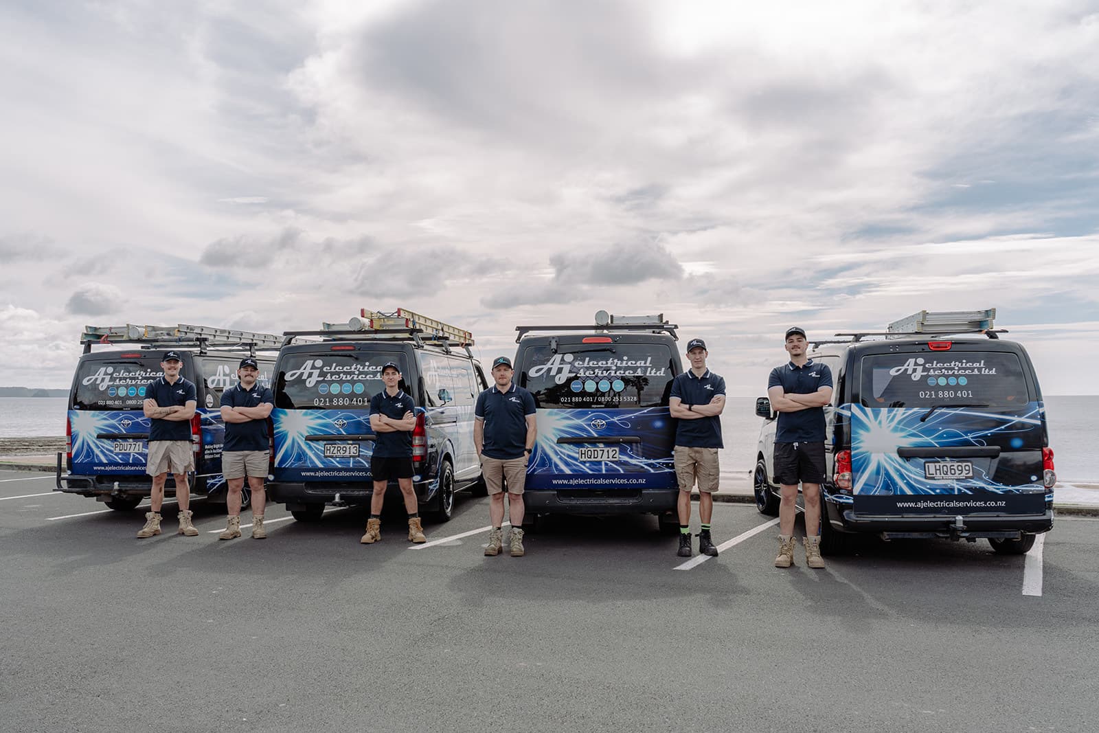 The AJ Electrical team and their fleet of vans
