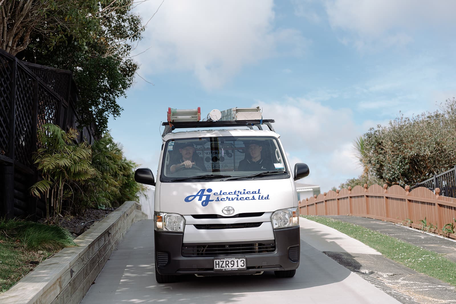 An AJ Electrical van arriving at a callout