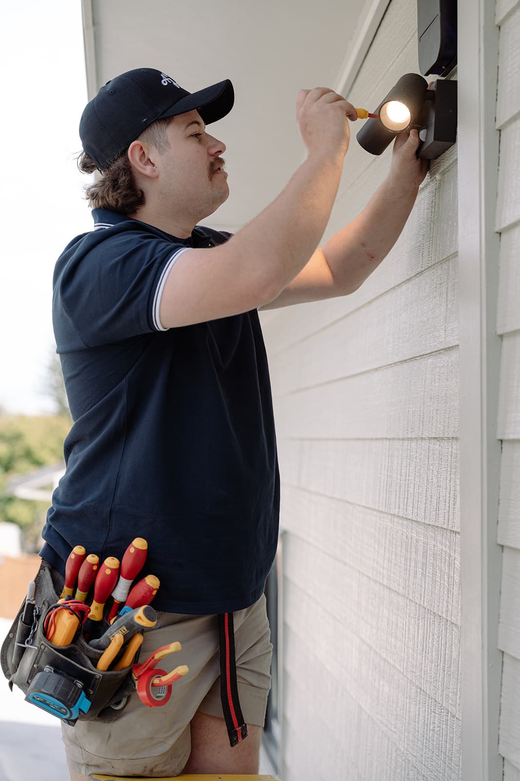 Installing a sensor light on the outside of a house
